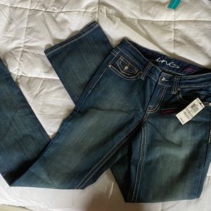 Dark blue inc jeans with tag